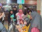 Sejumlah-warga-Kota-Medan-sedang-melakukan-aktivasi-KTP-Jadi-IKD.jpg