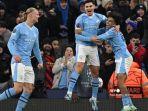 Striker-Manchester-City-asal-Argentina-19-Julian-Alvarez-tengah-merayakan-gol.jpg