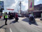 Suasana-arus-lalulintas-di-Simpang-Tiga-Parbuluan_.jpg