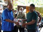 Syah-Afandin-Salurkan-Bantuan-untuk-Korban-Bencana.jpg