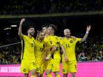 Timnas-Malaysia-selebrasi-menang.jpg