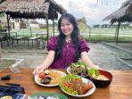 USUNG-KONSEP-TRADISIONAL-Seorang-pengunjung-Gora-dengan.jpg