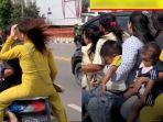VIRAL-Aksi-Emak-emak-Nekat-Boncengan-7-Orang-tak-Pakai-Helm-hingga-Ditilang-Polisi-Begini-Faktanya.jpg