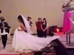 VIRAL-Pengantin-Wanita-Mendadak-Lari-Angkat-Gaun-Tinggalkan-Pernikahan-Bak-di-Drama-Dihujat-Netizen.jpg