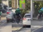 Viral-bule-berjaket-ojol-ugal-ugalan-dan-salip-mobil.jpg