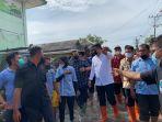 Wali-Kota-Medan-Bobby-Nasution-saat-meninjau-banjir-rob.jpg