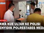 Wangsa-mengantar-kue-ulang-tahun-ke-penyidik_.jpg