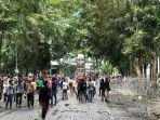 demo-dipukul-mundur.jpg