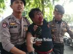 fitra-lufti-wakil-gubernur-pema-ft-usu-saat-digiring-polisi_20180920_234208.jpg