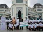 foto-bersama-pt-victoria-care-indonesia-bersama-bkm-masjid-raya-al-mashun-medan.jpg