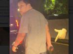 oknum-Polisi-menenteng-pistol-dengan-mobilberpelat-dinas-Polda-Metro-Jaya.jpg