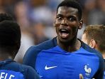 paul-pogba-saat-memperkuat-timnas-perancis_20180619_081215.jpg