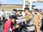 pengendara-roda-dua-yang-tidak-mengenakan-helm.jpg
