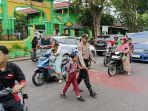 polisi-jaga-anak-sekolah-perbuatan-kecil-tapi-menyelamaktkan.jpg