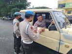 propam-polres-simalungun-cek-kendaraan-personel-tribun.jpg