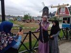 sejumlah-pengunjung-tampak-sedang-berfoto-ria-di-merci-barn.jpg