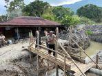 terisolasi-akibat-pengorekan-lahan-di-Desa-Unjur-Kecamatan-Simanindo.jpg