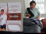 yanti-fitri-lumban-tobing-menangisi-jasad-yanto.jpg