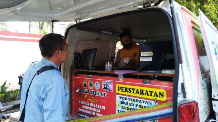 Ilustrasi-masyarakat-memanfaatkan-layanan-Samsat-Keliling.jpg