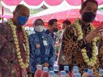 Bupati-Kudus-HM-Hartopo-kanan-saat-mendampingi-tim-evaluasi-desakelurahan.jpg