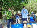 Gubernur-Aceh-Nova-Iriansyah-berdiri-dua-dari-kiri-saat-berziarah-ke-Makam-Potjut-Meurah-Intan.jpg