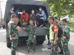 Banjir Masih Menggenang, Kodim 0733/KS Kerahkan Truk Tinggi dan Perahu Karet, Bantu Warga Genuk
