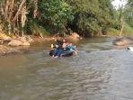 Pengunjung-saat-bermain-di-Sungai-Lojahan.jpg