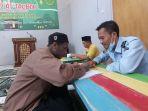 Waga-binaan-Rutan-Kelas-IIB-Kudus-saat-belajar-baca-tulis-Alquran.jpg