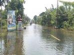 banjir-nusawungu-cilacap-jl-kroya.jpg
