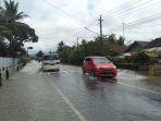 jalan-nasional-cilacap-direncam-banjir.jpg