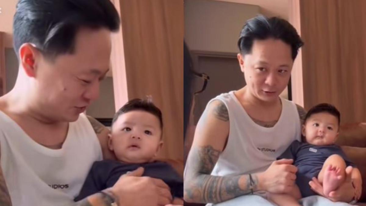 DJ BRAVY MOMONG ANDREW - DJ Bravy terlihat kembali bertemu dengan Baby Andrew setelah putus dari Erika Carlina. Ia tampak lengket dengan bayi berusia 3 bulan tersebut.