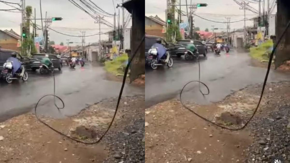 KABEL MENJUNTAI - Potret kabel menjuntai di Pekalongan sebabkan kecelakaan.