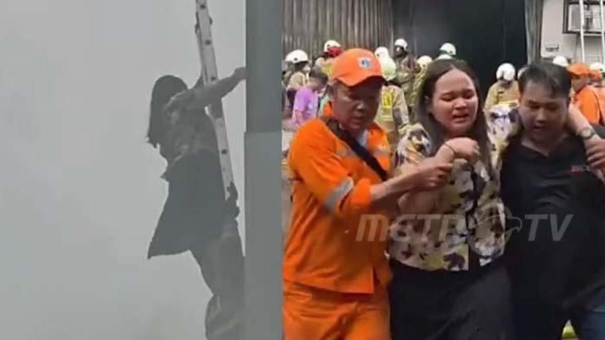 KEBAKARAN DI CEMPAKA PUTIH: Tangis karyawan Terra Drone pecah usai dievakuasi dari lantai enam akibat kebakaran pada Selasa (9/12/2025). 20 orang meninggal, termasuk ibu hamil.