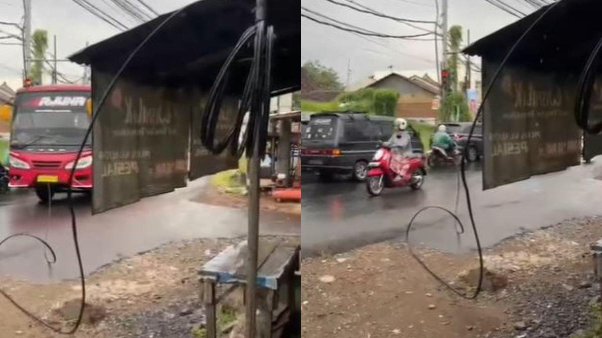 KABEL MENJUNTAI - Potret kabel menjuntai di Pekalongan sebabkan kecelakaan.