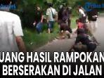 Uang-Hasil-Rampokan-Berhamburan-di-Jalan-2.jpg