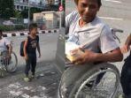 ayah-dan-anak-viral-karena-tolak-bantuan-berlebih.jpg