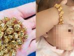 bayi-dipakaikan-gelang-emas.jpg