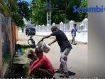 pasangan-selingkuh-dimandikan-warga-dengan-air-comberan.jpg