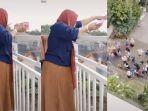 video-perempuan-membagi-bagikan-uang-rp-100-juta-dari-balkon-berhasil-menarik-perhatian-warganet.jpg