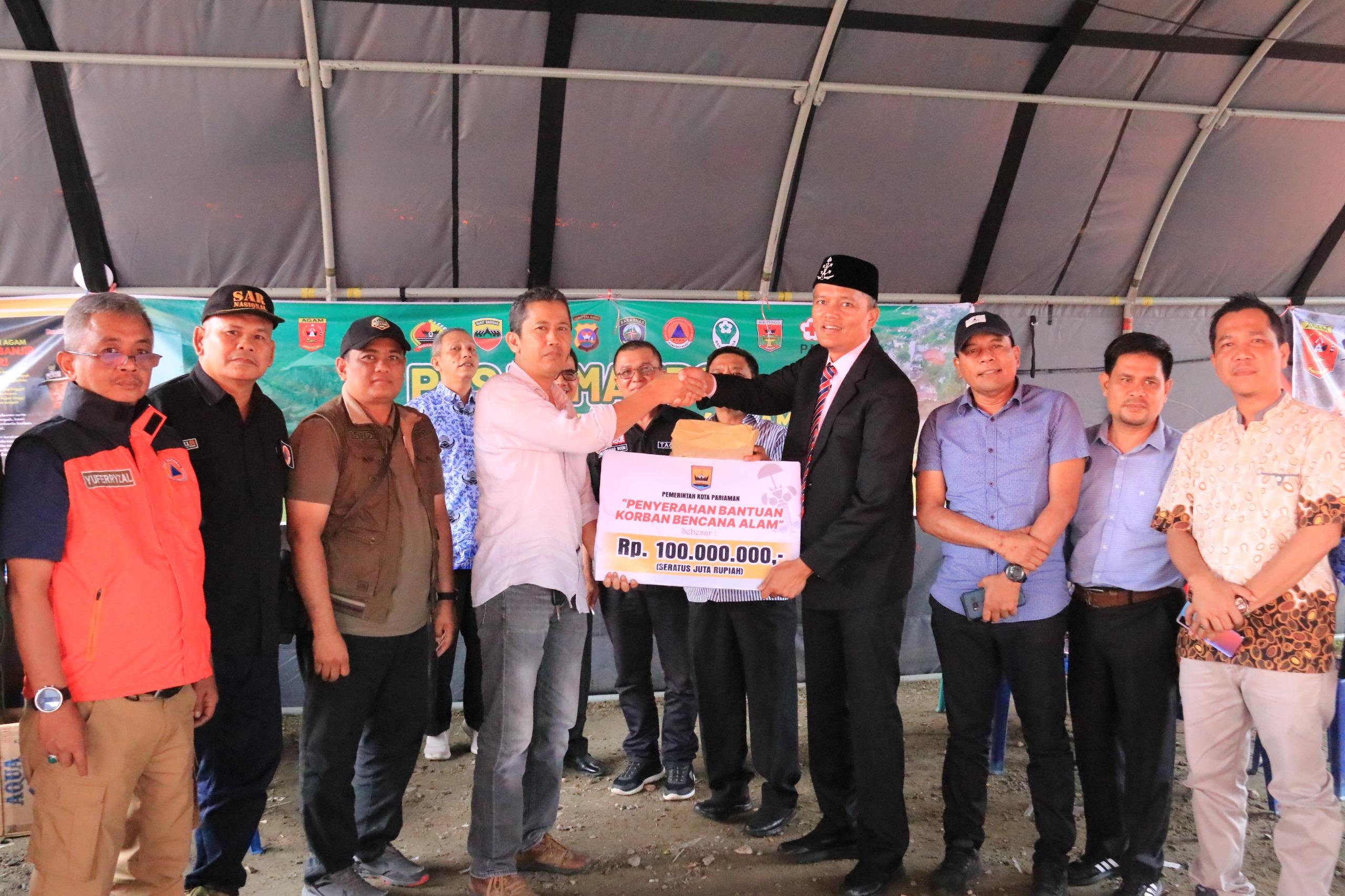 Penjabat Wali Kota Pariaman Serahkan, Bantuan Tunai Rp 100 Juta untuk Korban Bencana di Agam