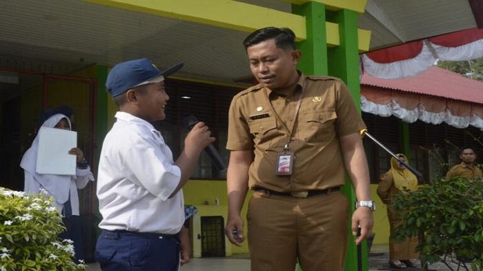 Kadis Kominfo David Rinaldo Jadi Irup di SMPN 16 Sijunjung: Belajar dan Kerja keras Meraih Cita-cita