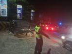 Akibat-rem-blong-satu-unit-mobil-jenis-Isuzu-Panther.jpg
