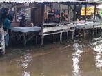 Banjir-menggenangi-badan-jalan-di-Nagari-Manggopoh-Palak-Gadang-Ulakan.jpg