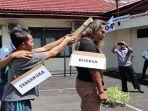 Polisi-Gelar-Rekonstruksi-Kasus-Pembunuhan-Pelajar-di-Agam.jpg