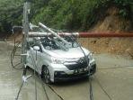 Satu-unit-mobil-ditimpa-tiang-listrik-di-Kecamatan-Lubuk-Kilangan-Kota-Padang123.jpg