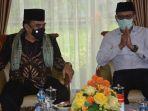 gubernur-sumbar-irwan-prayitno-saat-menyambut-kedatangan-menteri-agama.jpg