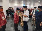 kafilah-sulawesi-barat-saat-tiba-di-bandara-internasional-minangkabau.jpg