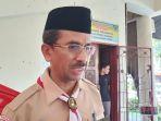 kepala-dinas-pendidikan-kota-padang-barlius-pramuka.jpg