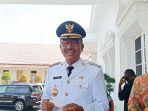 khairunas-usai-dilantik-menjadi-bupati-solok-selatan-di-gedung-auditorium-gubernuran.jpg