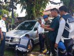 penertiban-mobil-parkir-sembarangan.jpg